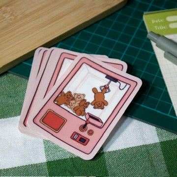 Teddy Bears Trapped in a Claw Machine Translucent Vinyl Sticker
